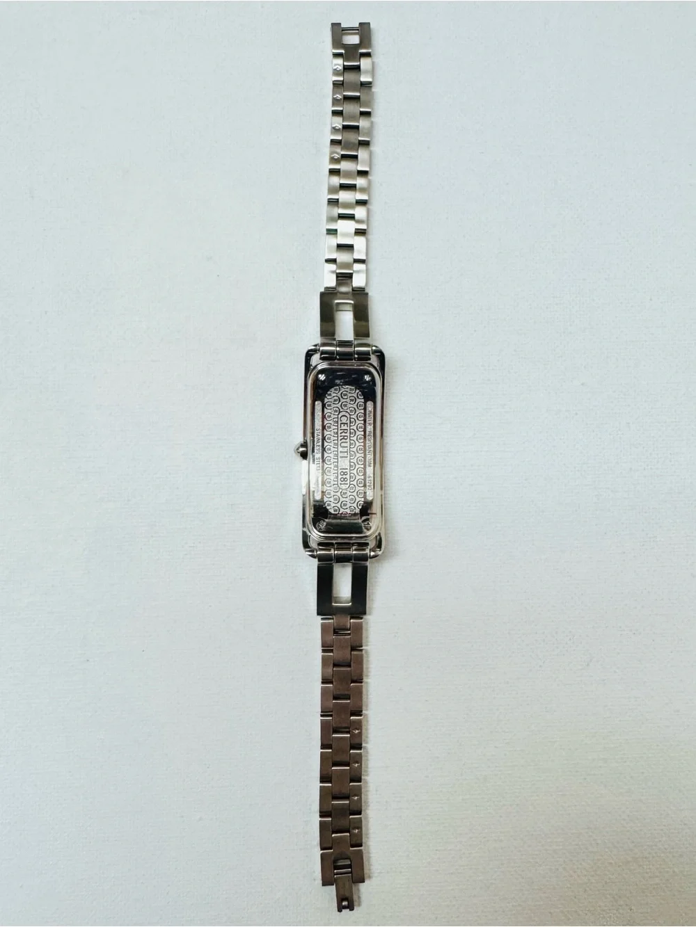 Cerruti 1881 C Wave Black Dial Women's Silver Curved Tank Bracelet Watch 61202